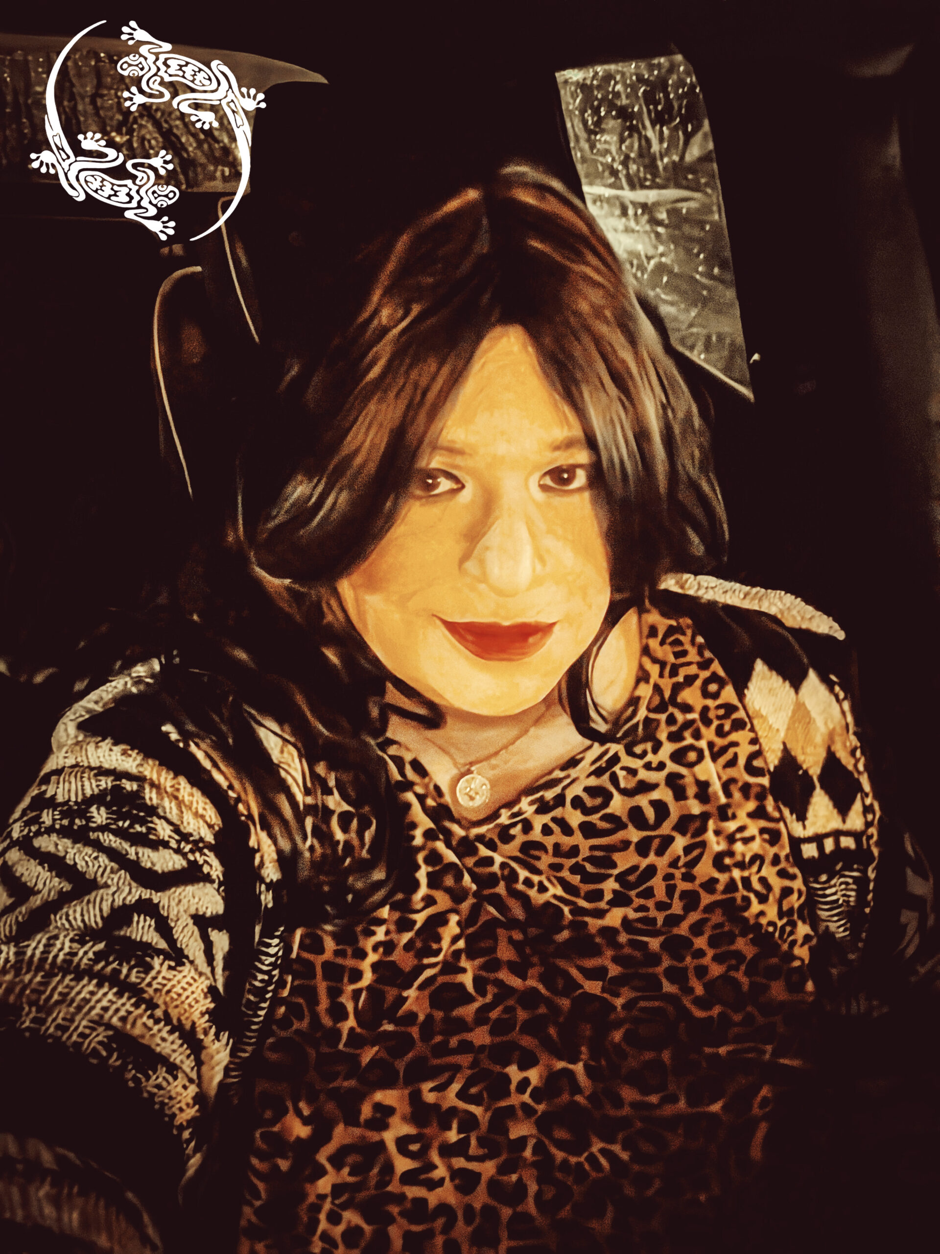 Mistress Ilya is sitting in her car. 