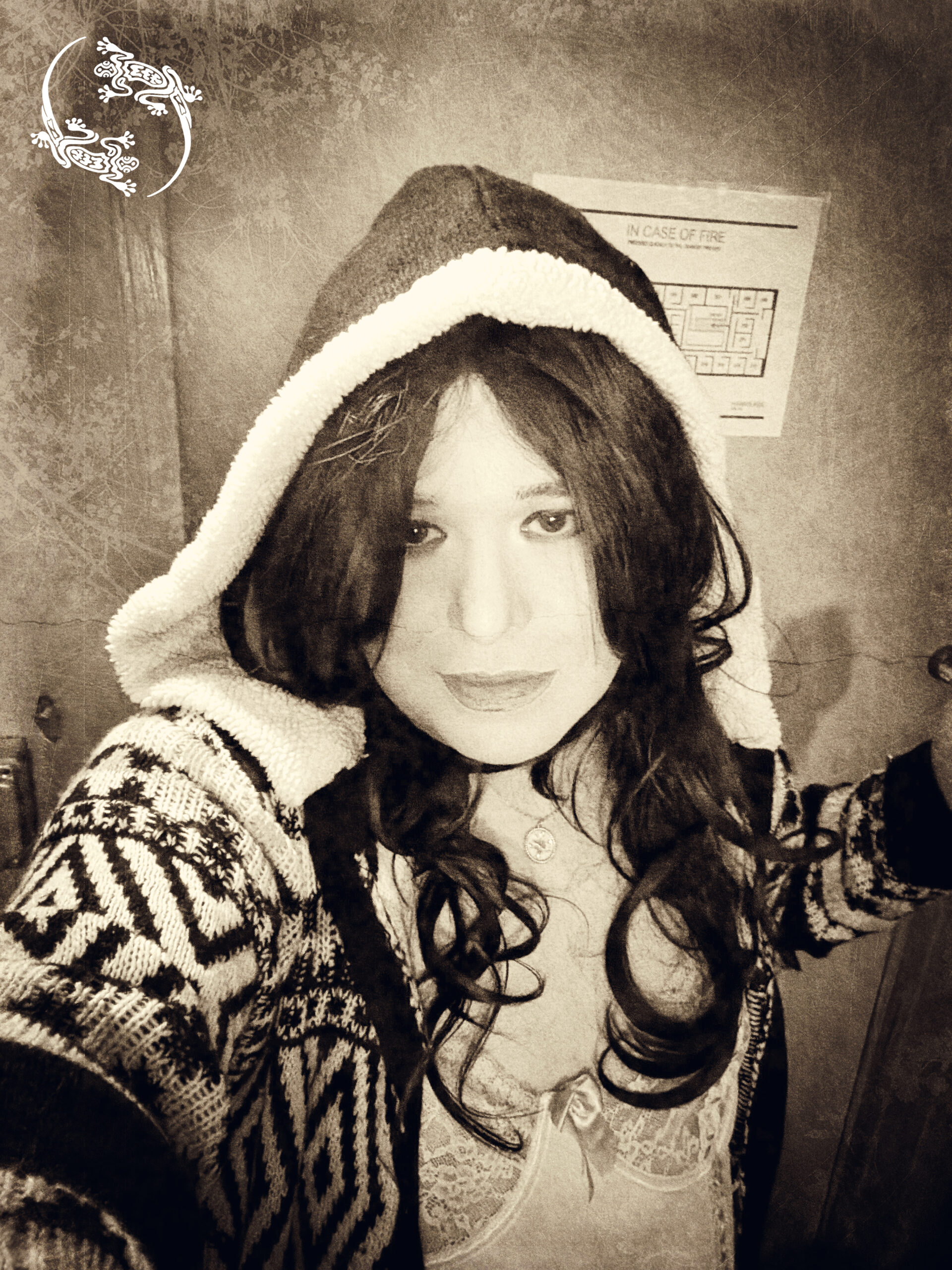 Mistress Ilya is wearing a coat. 