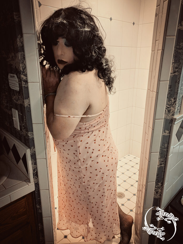 Mistress Ilya is up against a shower wall.