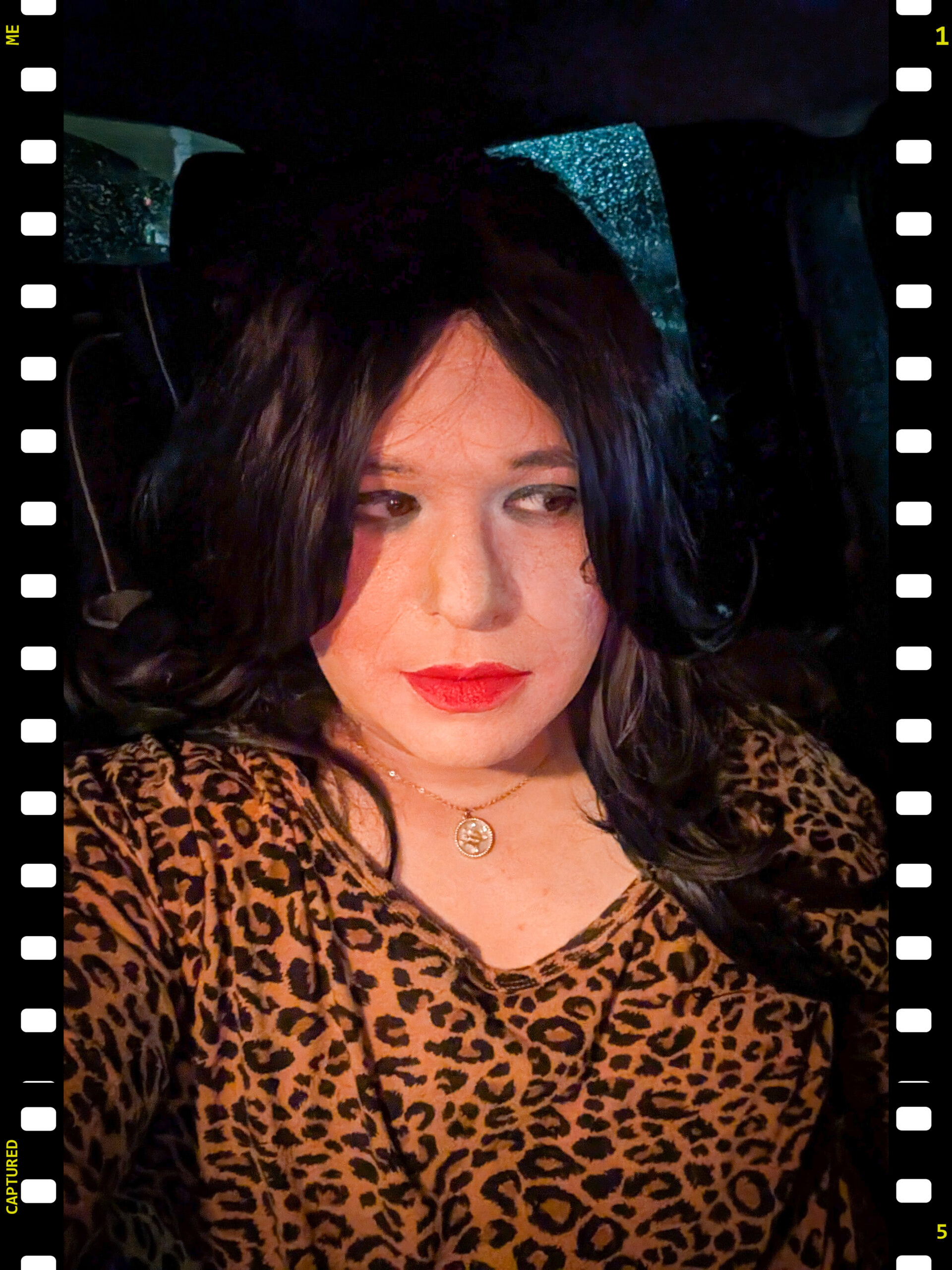 Mistress Ilya is looking away. 